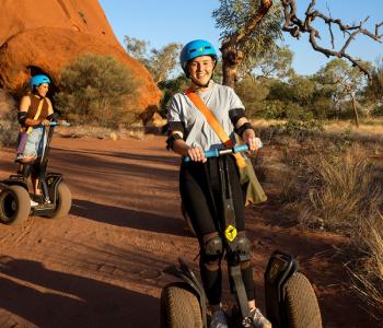 People riding vehicles in the Outback