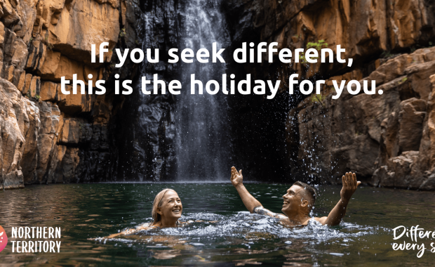 Image of a couple in Southern Rockhole waterfall, with text saying 'If you seek different, this is the holiday for you'
