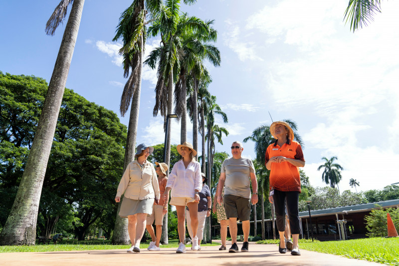 Visitors with a tour guide on a walking tour at the George Brown Botanic Gardens